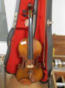 A traditional violin having 14inch two piece back, unlabelled with similar bow and hard case