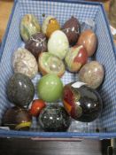 A selection of 20th century semi precious stone and agate stone turned eggs