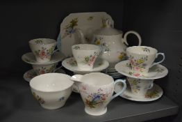 A 20th century part tea service by Shelley in the Wild Flowers pattern, also included is a Mayfair
