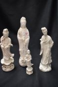 Four Chinese blanc de Chine figures of Guanyin