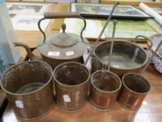 A set of early 20th century copper corn measures with similar copper items including kettle and