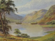 John W Smith, (20th century), a watercolour, Lakeland landscape, signed and dated 1921, 20 x 30cm,