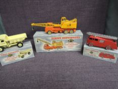 Three Dinky diecasts, 955 Fire Engine with Extending Ladder, 965 Euclid Rear Dump Truck and 972