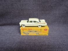 A Dinky diecast, 191 Dodge Royal Sedan, Cream in original correct spot box