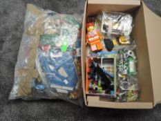 A collection of mixed vintage Lego, all loose in box and large bag, Lego City Instructions seen