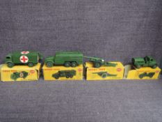 Four Dinky diecasts, 626 Military Ambulance, 643 Army Water Tanker, 677 Armoured Command Vehicle and