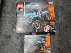 Two Lego Technic Sets, All Terrian Tow Truck 42070 and Remote Control Stunt Racer 42095, both in