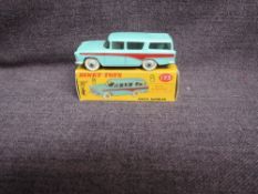 A Dinky diecast, 173 Nash Rambler, Light Green & Red, in original correct spot box