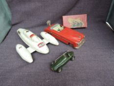 A Distler US Zone Germany Tin Plate and Clockwork Packard Convertible Car, red with cream