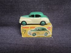 A Dinky diecast, 159 Morris Oxford, Green & Cream, in original box, missing end flaps
