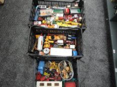 Three boxes of playworn diecast and plastic vehicles and accessories including Corgi, Britains and