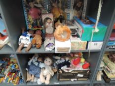 Two shelves of mainly modern Dolls and Bears including two The Family Company Adventures from The