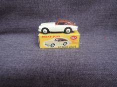 A Dinky diecast, 167 AC Aceca Coupe, Cream & Brown in original correct spot box