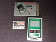 A 1983 Nintendo Japan Game & Watch Panorama Screen Popeye Game, numbered 90100697, with instructions