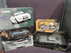 Five mixed scale diecasts, UT Models 1:18 scale BMW Z3 Roadster 007 and similar, Auto Art 007 DB5