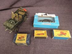 A Matchbox Lesney no65 Class Combine Harvester and no73 Racing Car both boxed, a Matchbox Lesney No3