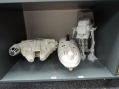 Three 1980's Kenner and similar Star Wars Vehicles, At-At, Rebel Transporter and Millennium Falcon