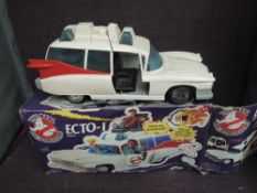 A Kenner Columbia Pictures original plastic model Ecto-1 Vehicle, not complete, in original box
