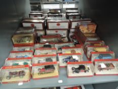 A shelf of Matchbox Models of Yesteryear diecasts, all in original window display boxes, approx 30
