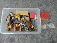 A box of Britains and similar plastic and diecast Farm Machinery, Animals and Accesories