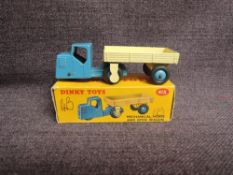 A Dinky diecast, 415 Mechanical Horse and Open Wagon, Blue & Cream, in original box
