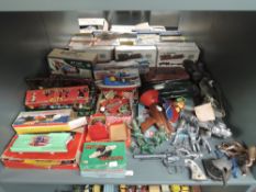 A shelf of vintage Toys and Games including 1950's Empire plastic Dream Car in original box,