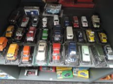 A shelf of modern foreign diecasts, all on bubble cards, approx 29