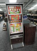 A 1980's Fruit Machine, Pussy Cat, 10p per play, height 180cm, width 55cm, we don't test for