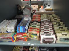 A shelf of modern diecasts including Days Gone, Auto Club etc, all boxed