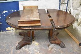 A 20th century banded mahogany extending dining table, in the Victorian style, having moulded edge