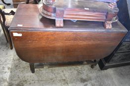 A 1940s oak barley twist dropleaf table. 73CM. X 106CM.