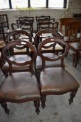 A set of six Georgian design mahogany dining chairs, comprising four singles chairs and two carvers,