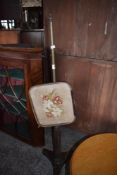 A Victorian Mahogany pole screen (af) 134CM.