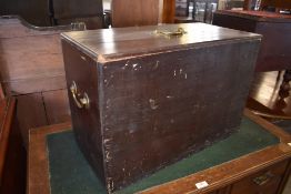A stained pine box, with brass handle to top and sides. 39CM. X. 58CM.