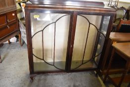 A 1930s glazed mahogany display cabinet. 126CM. X119CM.