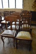 A set of four early 20th century oak Carolean design chairs. Sold together with a set of early