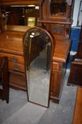 A modern arched mahogany dressing mirror. 127CM.