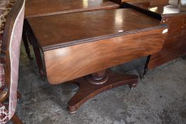 A 19th century mahogany pedestal. Pembroke table the rectangular top with rounded flaps over a
