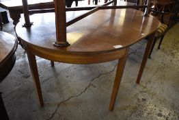 An Edwardian inlaid mahogany D end dining table with single central leaf. 75CM. X 153CM.