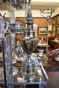 A Large 20th century brass table lamp, with turned fluted and foliate decoration. 65CM.