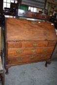 A 19th century Mahogany bureau of traditional design, having fall front over 3/2 drawers, raised