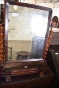 A Victorian mahogany swing dressing mirror with barley twist uprights. 88CM.