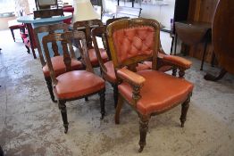 A set of seven late Victorian oak salon chairs, comprising armchair and seven single chairs, each