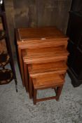 A nest of four modern Chinese hardwood tables of simplistic design. Largest. 67CM.
