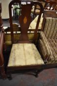 A 1920s mahogany Queen Anne style dining chair. the central vase splat with inlaid conch shell