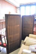 An Edwardian stained mahogany three fold room screen with material panels, each section measuring