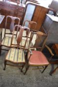 An Edwardian inlaid mahogany carved chair. Sold together with three Edwardian mahogany single