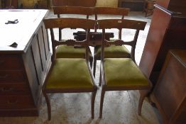 A set of William IV mahogany dining chairs, each having foliate carved top rails, carved mid