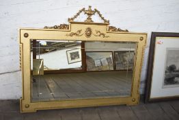 An ornate gilt framed over mantle mirror of neoclassical design, 104CM. X. 127CM.