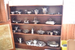 A Modern stained pine open bookcase, with four shelves 151CM. X. 153CM.